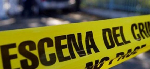 En camioneta encuentran a hombre asesinado