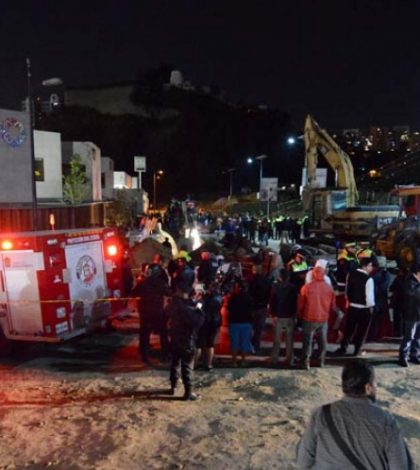 Buscan cuerpo de cuarto trabajador sepultado en Huixquilucan