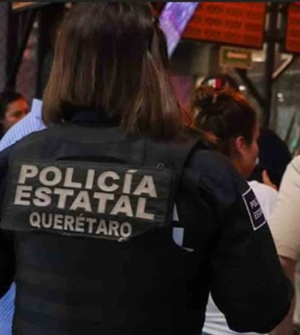 Policía agrede a mujer en Querétaro, sus compañeros lo detienen
