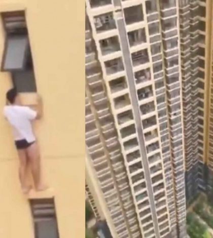 Captan a hombre semidesnudo colgando de edificio, aquí la historia  (video)